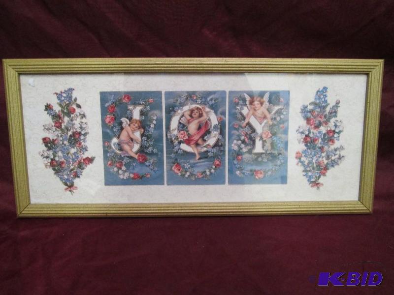 Framed art. Joy spelled out with ...