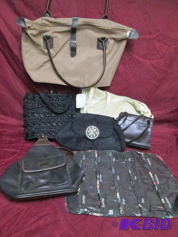 lot of 7 new handbags. Most with st...
