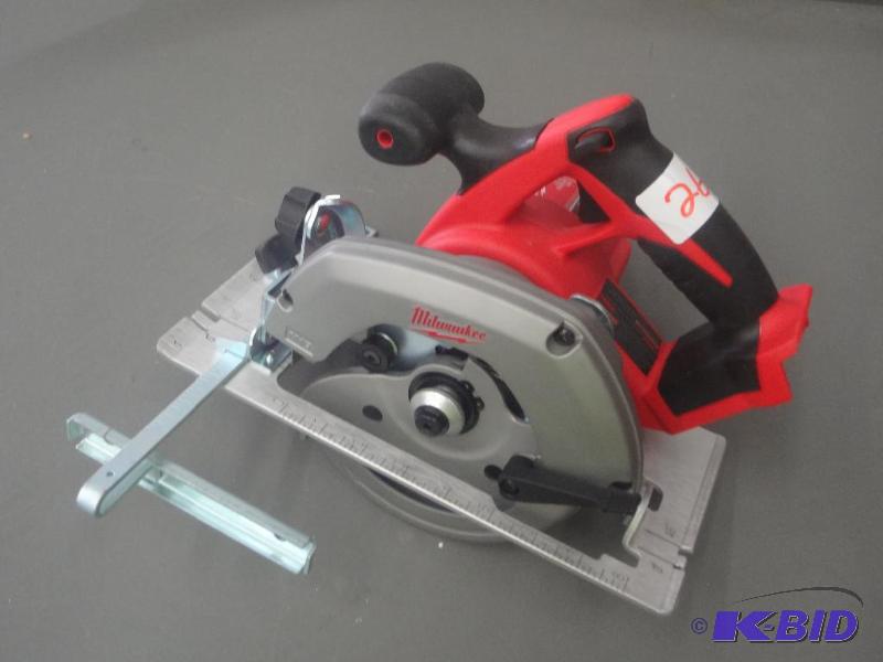 lot 26 image: Milwaukee 18Volt 6.5" Circular Saw, Work...