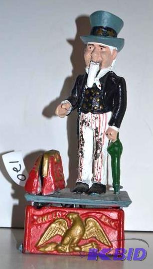lot 120 image: Vintage Uncle Sam bank cast iron ba...