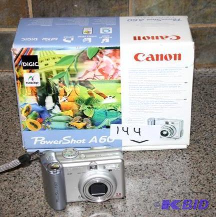 lot 144 image: Canon Power Shot A60 with box...