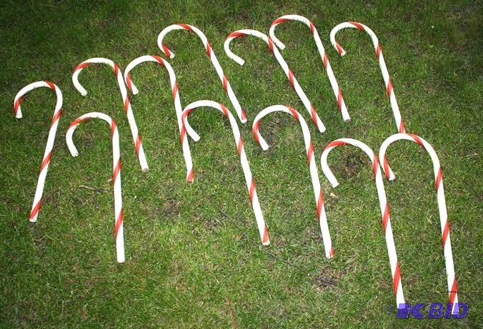 lot 159 image: Plastic candy canes 27" tall...