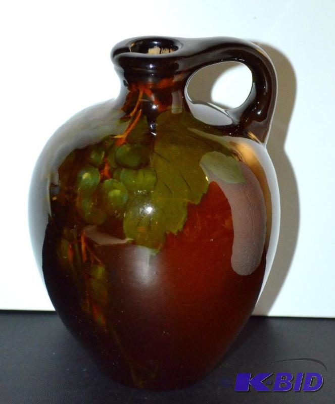lot 178 image: Antique Rookwood Jug - grape design...