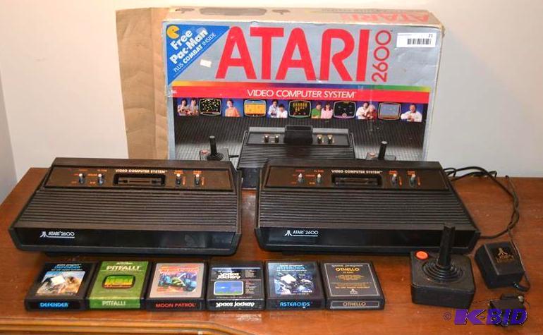 lot 21 image: Atari 2600 in original box. Include...