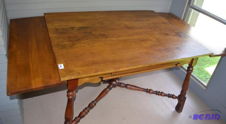 lot 8 image: Wood table with two self storing le...