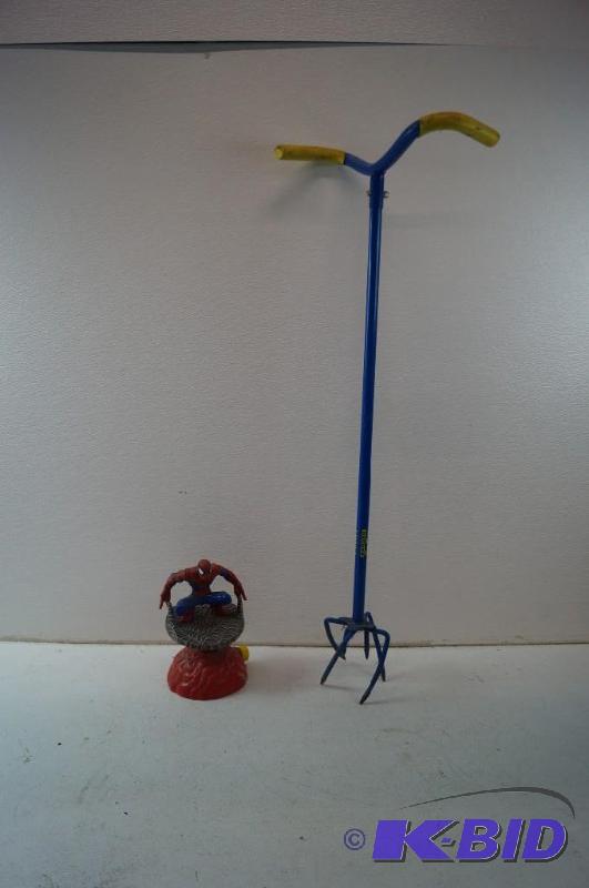 Garden claw and spiderman sprinkler