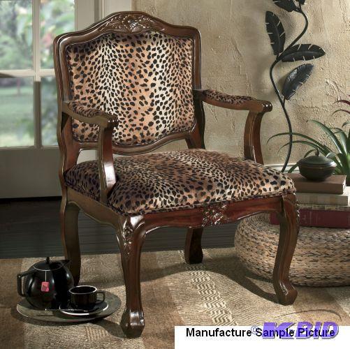 lot 12 image: Leopard Arm Chair - Fluid grace and...