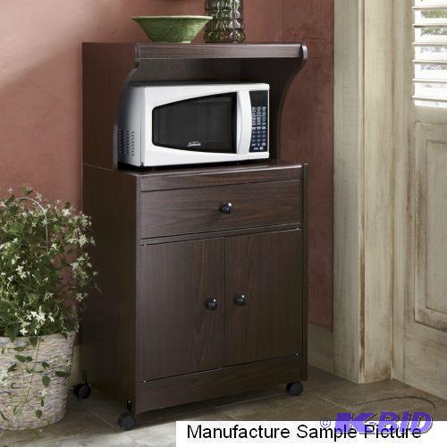 lot 15 image: Walnut Finish Exclusive Microwave C...
