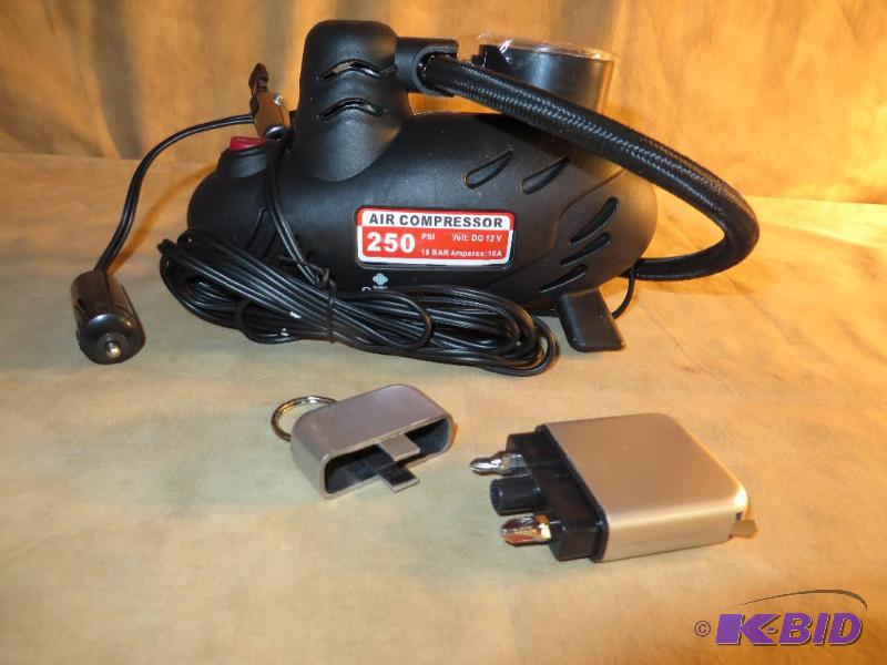 Small 12 volt air pump and a tape measure tool set key ring combo