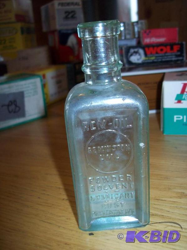 Small glass bottle -Rem Oil item 84...