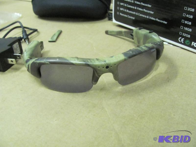 lot 32 image: Check out these cool camo sunglasse...