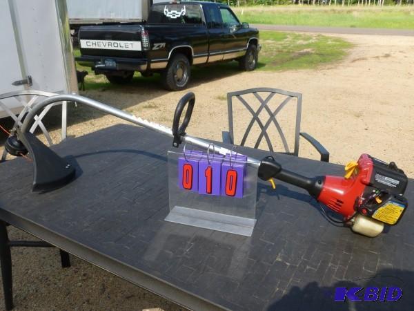 lot 10 image: Homelite trim lite 2 cycle gas trim...
