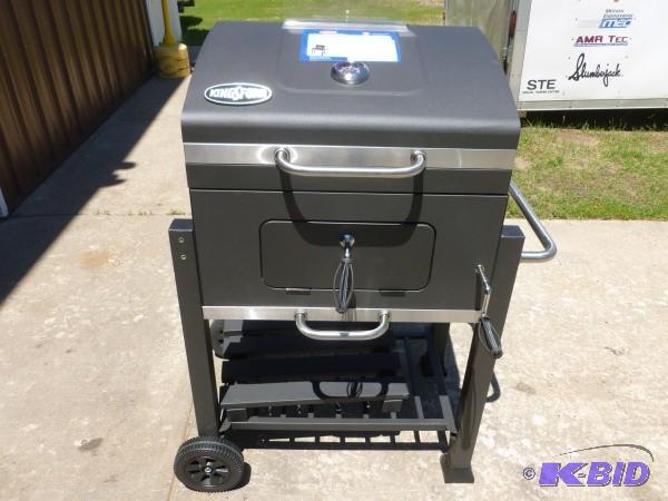 lot 4 image: Kingsford 24" charcoal grill. ...
