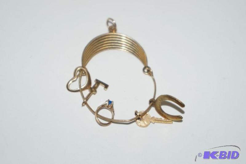 14 Karat Gold Charm Holder with 5 Charms 2.3 Grams