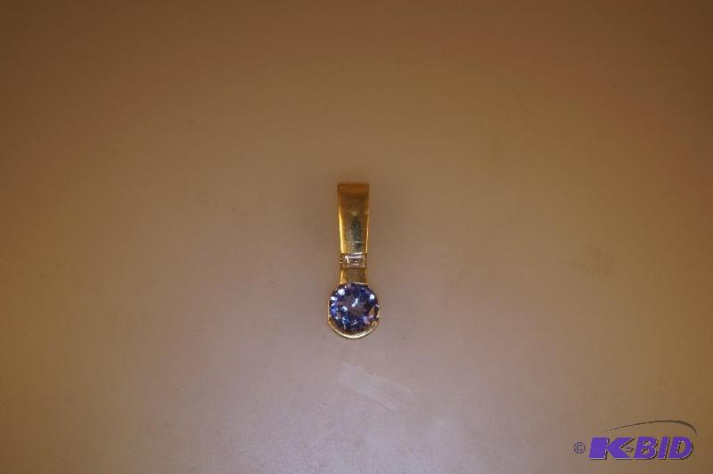 14 Karat Gold Tanzanite and Diamond Pendant