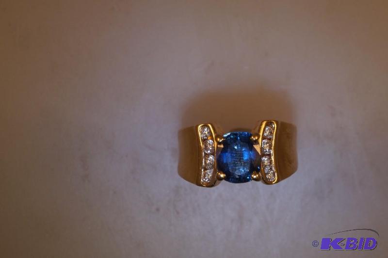 14 Karat Gold Blue Sapphire and 14 Caret TW Diamond Ring