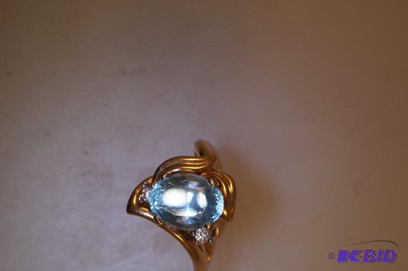 14 Karat Gold Aqua Marine Diamond Ring