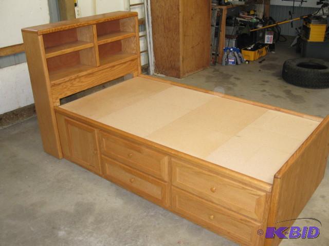 lot 1 image: Twin bookcase bedframe, one cabinet...