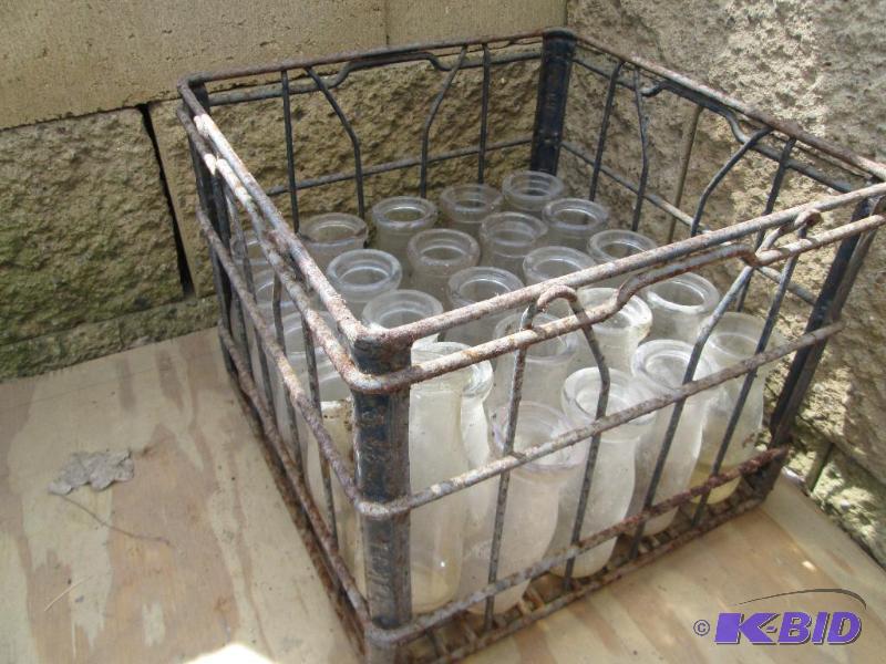 Metal milk crate with bottles 1l...