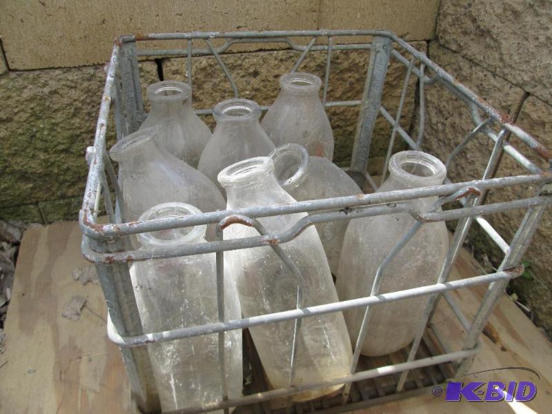 Metal milk crate with bottles 1n...