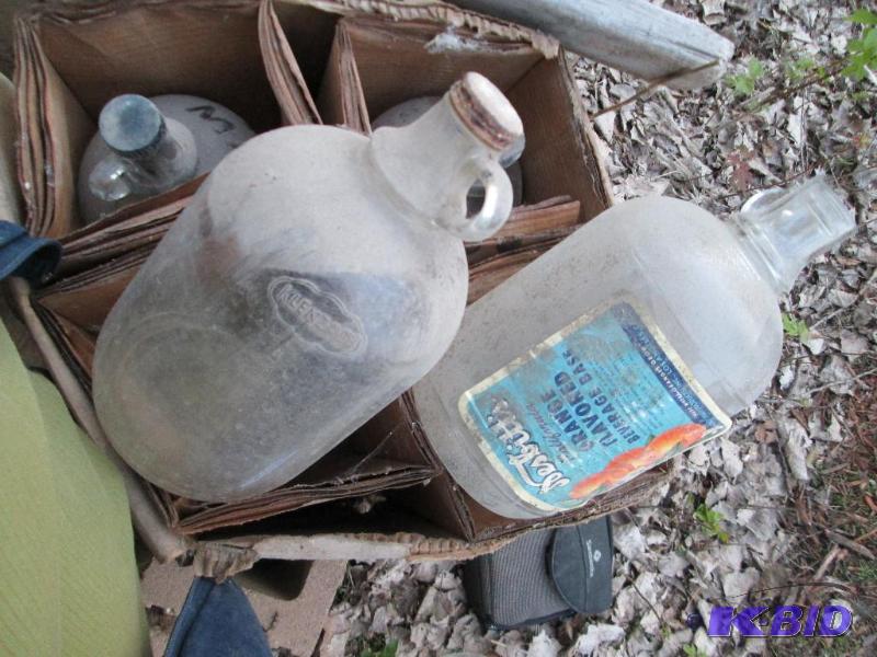 Box of glass gallon orange beverage...