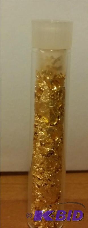 VIAL OF GOLD FLAKES...