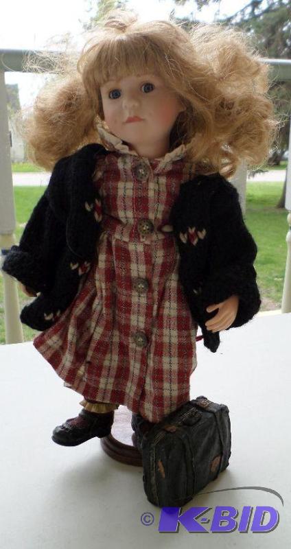 Traveling china doll with suitcase ...