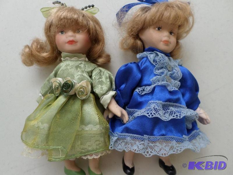 Two mini sized china dolls...