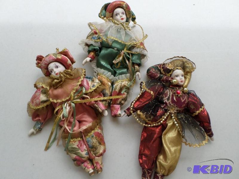 Three mini jester china dolls, very...