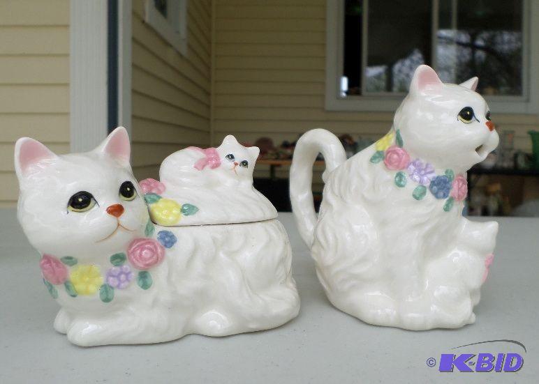Car creamer and sugar containers...