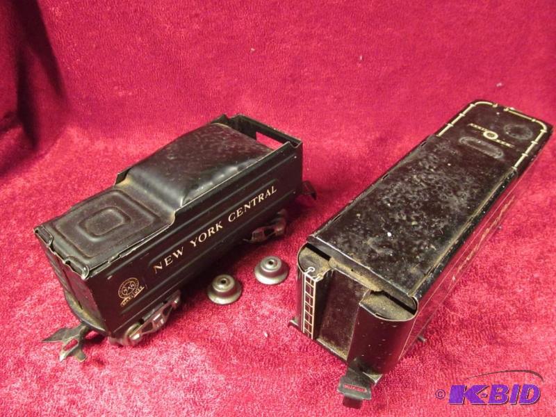 lot 54 image: Lot of 2 1950s O Scale Marx Tin Train Cars