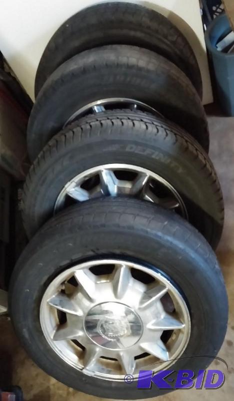 lot 1 image: Set of 4 16" Cadillac Rims...