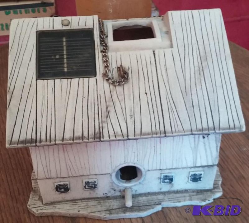 lot 76 image: Heavy resin barn bird house. It loo...