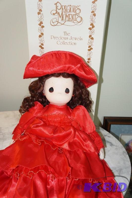 lot 11 image: Ruby of the Precious Jewels Collection Precious Moments Doll in Original Box