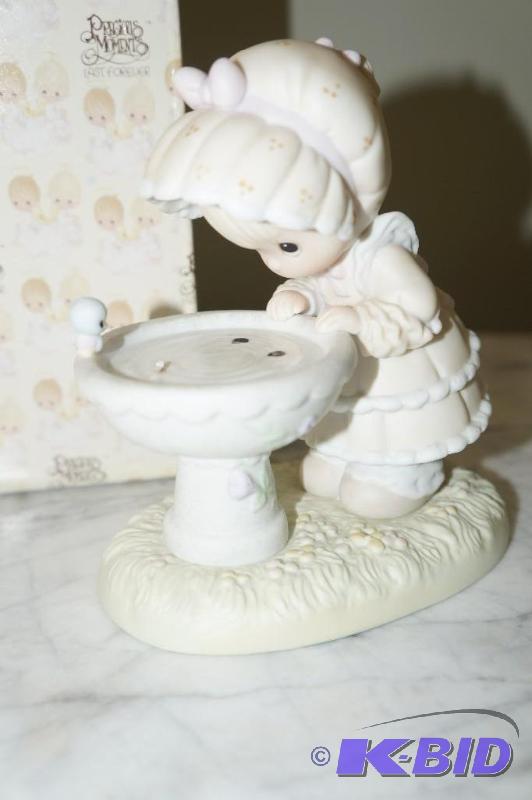 lot 153 image: A Reflection Of His Love Precious Moments Figurine with Cubic Zirconia Stone