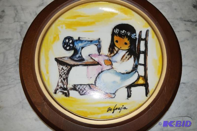 lot 168 image: Girl with Sewing Machine 1986 DeGrazia Plate with Wood Frame