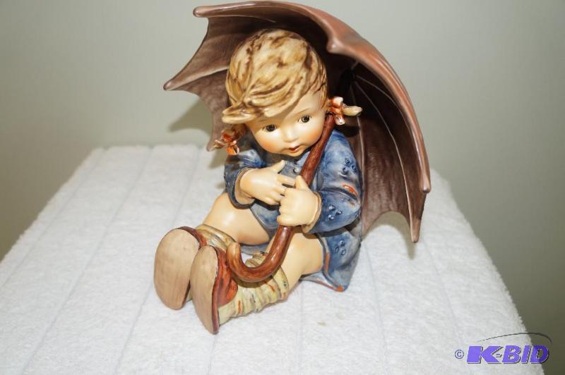 lot 219 image: Umbrella Girl 1991 M.I. Hummel Figurine