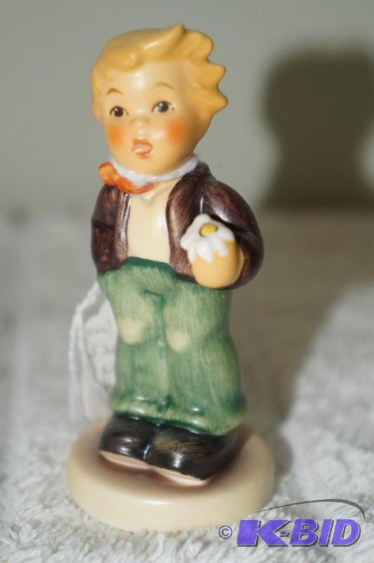 lot 234 image: A Flower For You 1999 M.I. Hummel Figurine