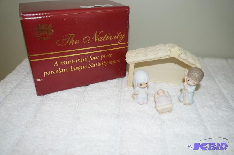 lot 254 image: Precious Moments 4 Piece Porcelain Mini Nativity