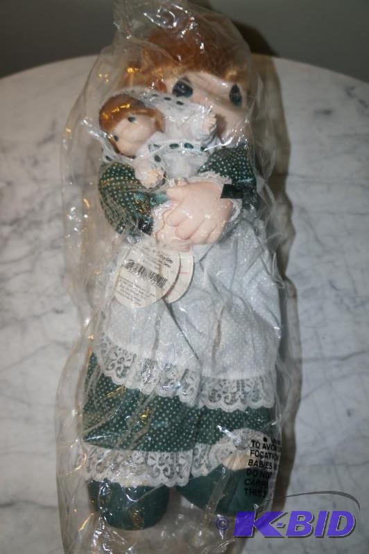 lot 35 image: Kelly & Baby Erin from the Mommy, I Love You Series, 7th Ed. Precious Moments Doll in UNOPENED PKG