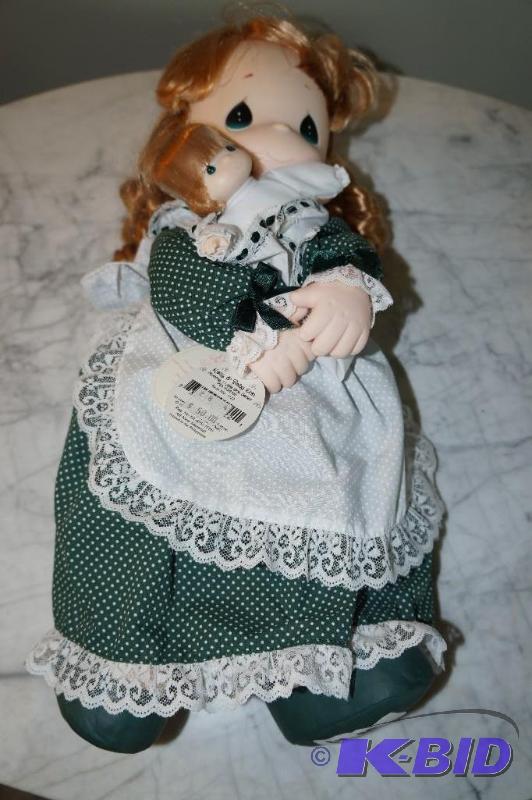 lot 39 image: Kelly & Baby Erin from the Mommy, I Love You Series, 7th Ed. Precious Moments Doll