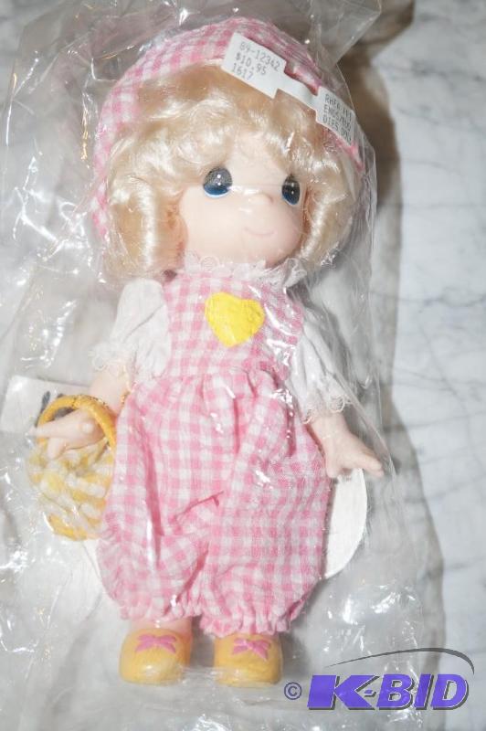 lot 41 image: Rhea fromthe Friends & Buddies Pink Series Precious Moments Doll in UNOPENED PACKAGING