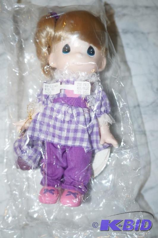 lot 42 image: Zoe from the Friends & Buddies Purple Series Precious Moments Doll in UNOPENED PACKAGING