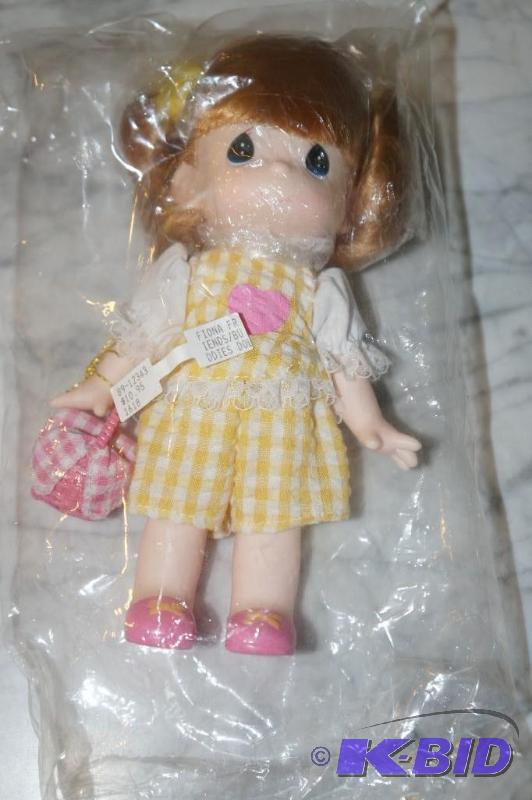 lot 45 image: Fiona from the Friends & Buddies Yellow Series Precious Moments Doll in UNOPENED PACKAGING