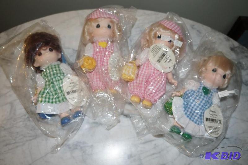 lot 46 image: Set of 4 Precious Moments Dolls from the Friends & Buddies Series  all in UNOPENED PACKAGING