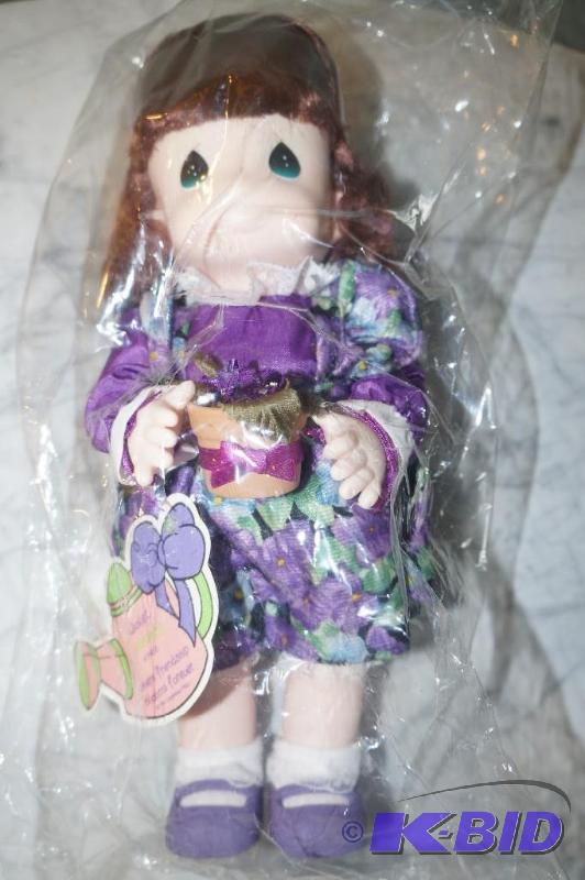 lot 47 image: Violet February from the Garden of Friends Series Precious Moments Doll in UNOPENED PKG
