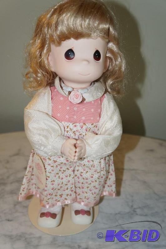 lot 51 image: Angela Precious Moments Doll with Stand