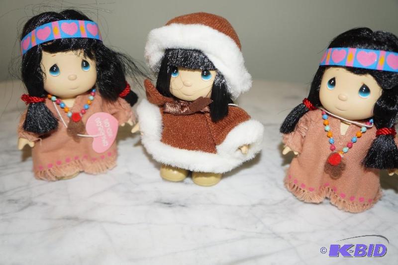 lot 57 image: Set of 3 American Indian Precious Moments Dolls