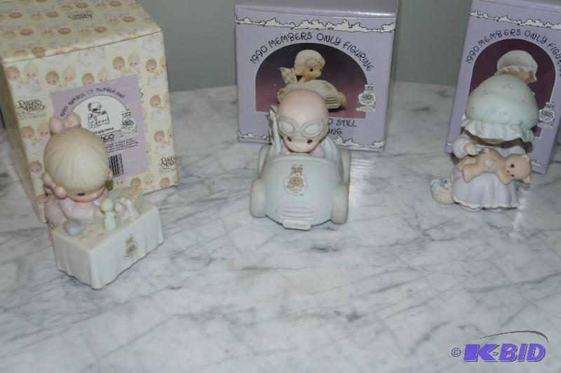 lot 71 image: Lot of 3 1990 Members Only Precious Moments Figurines