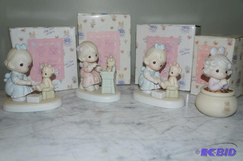 lot 75 image: Lot of 4 1994 Members Only Precious Moments Figurines